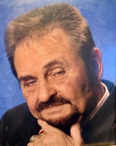 Paul Edward “Doughbelly” Mangrum